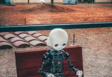 일상 속 AI 건강 관리, 스마트하게 챙기는 웰빙 루틴 black and white robot toy on red wooden table