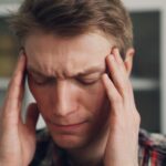 만성피로, 일상 속 작은 변화로 충분히 극복할 수 있다 a man holding his hands to his ears